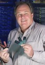 Taylor1 Jerry Taylor, MU professor of animal sciences, holds his "SNP" or "snip" chips. Using the technology, Taylor and a team of international researchers created a very accurate and widespread "family tree" for cows and other ruminants, going back as far as 29 million years.