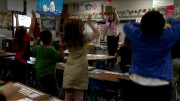 Students participate in an activity break during class