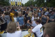 Students from the class of 2022 receive the distinctive 
